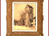 tableau représentant une église avec un clocher, dans un cadre doré