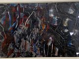une image d'un tableau accroché au mur