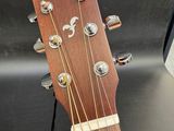 an image of a close up of a guitar with a price tag attached to it
