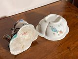 a small cup and saucer sitting on a wooden table
