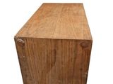 a wooden box that is sitting on a white surface