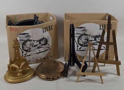 two boxes with different items in them sitting on a table