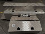 a metal tool box that is sitting on the ground