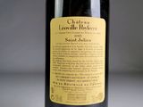 a bottle of wine that is sitting on a table