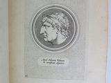 an open book with a drawing of a man ' s face on it