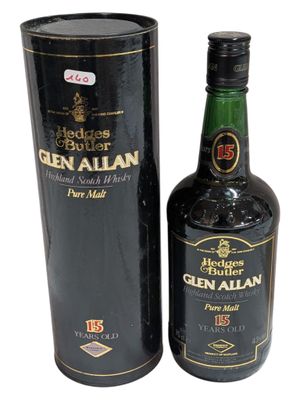 a bottle of glenallan is next to a black box