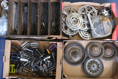 a box full of assorted items sitting on the floor