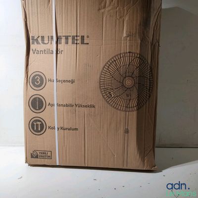 a cardboard box that has a fan inside of it