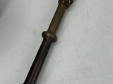 pair of antique brass and black wooden handles with a lion head on the handle