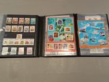 a lot of different stamps on the pages of a book