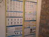 a poster on the wall of a bathroom with a heater