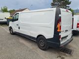 a white van that is parked in a parking lot