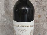 a bottle of wine that is sitting on a table
