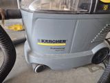 a vacuum cleaner that is sitting on the floor
