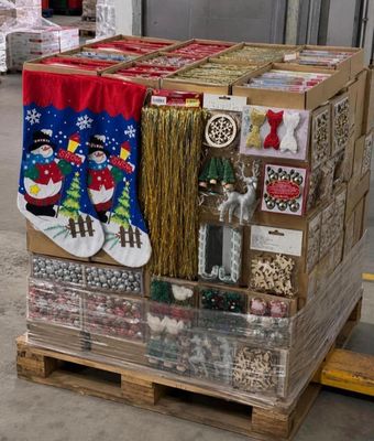 a pallet with a bunch of christmas decorations on it