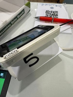 a cell phone that is sitting on top of a table