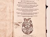 an open book with a picture of a dragon on it