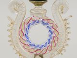 an image of a glass bottle with a ring on it