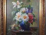 a painting of flowers in a blue vase on a table