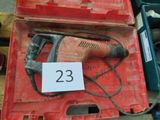 a red box with a hammer and a sign on it