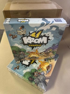 the box for the game boom evolution is sitting on a table