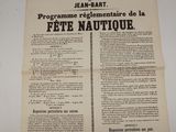 an old french newspaper with a black and white image of a cat