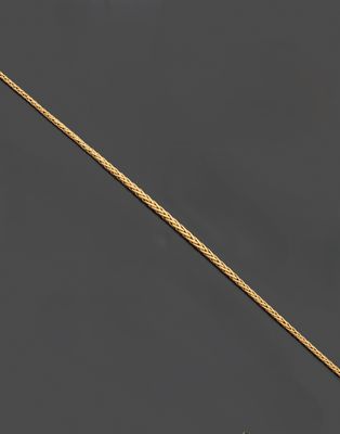 un collier à maillons en or jaune 18 carats avec un fermoir serti de diamants
