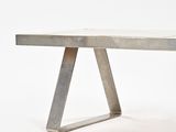 an image of a concrete table with a metal base