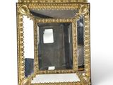 an image of a gold framed mirror on a white background