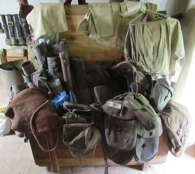 a lot of bags that are sitting on a bench