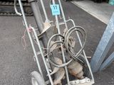 an image of a hand truck with a bunch of tools on it