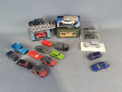 a lot of toy cars that are sitting on a table