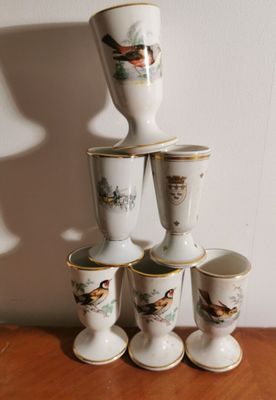 five cups stacked on top of each other on a table