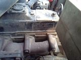 a close up of an old engine in a truck