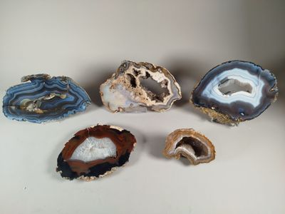 several different types of agate on a white surface