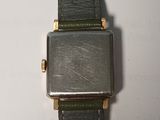 a watch that is sitting on top of a table