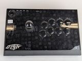 a close up of a video game controller on a table