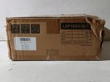 the box is sitting on the floor next to the wall