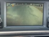 a picture of a car ' s dashboard with a camera mounted on it