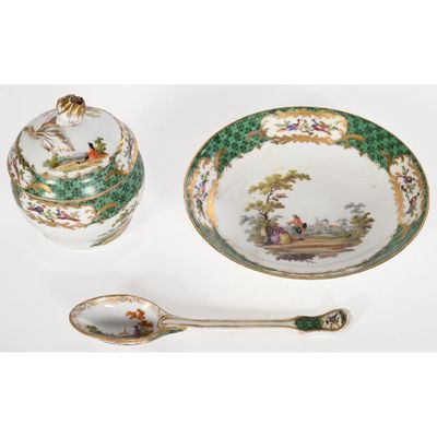 une image représentant une table dressée avec un bol, une cuillère et un repose-cuillère