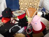 a pile of clothes and hats in a bag