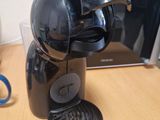 a coffee maker that is sitting on a table