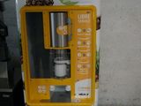 a vending machine that has a pineapple on it