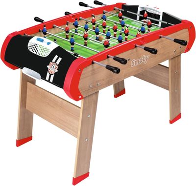 the foosball table is made out of wood and has a red top