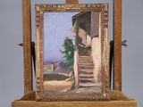 a picture of a painting on a easel on a table