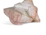pink and white marble sculpture of a shell on a white surface