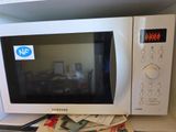 a microwave that is sitting on top of a counter