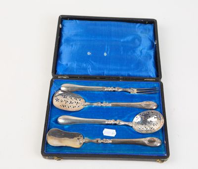 a silverware set in a blue case on a table