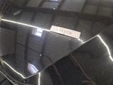 a sticker on the hood of a black car