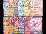 beaucoup de cartes pokemon sur la table